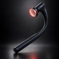 Warm Compress Massage Gun on dark studio background